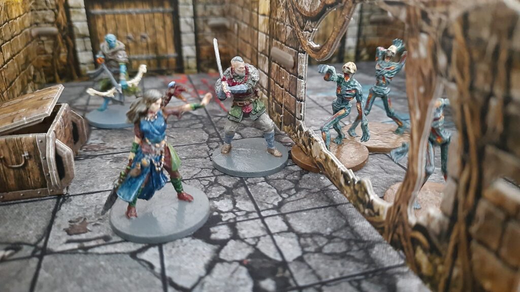 Maladum - Dungeons of Enveron Die Abenteurer Callan und Moranna in Aktion